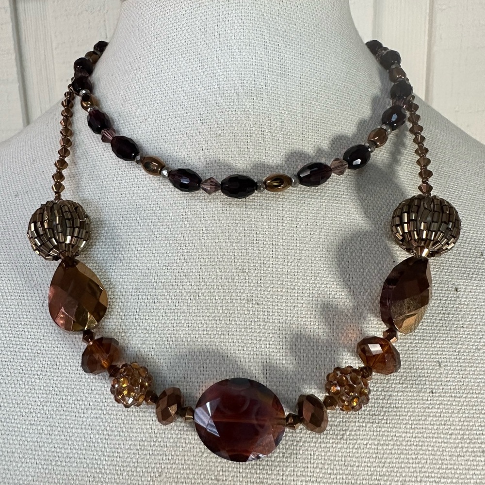 Two neutral tone fashion statement necklaces